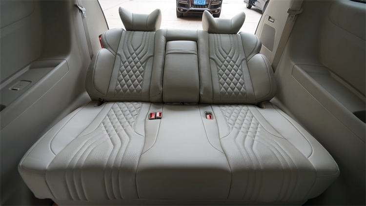 Customized luxury Aero car one-piece sofa bed seat with touch-screen and storage armrest